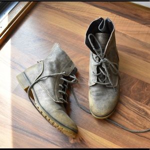 Distressed combat boots